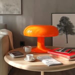 https://www.madeindesign.com/prod-lampe-de-table-nessino-plastique-orange-o-32-cm-reedition-1960s-artemide-ref0039070a.html?gad_source=1&gclid=CjwKCAjwuMC2BhA7EiwAmJKRrBI1npt9VnjUb4pGI8wv8qKQKiaVmPUMD7vtoZHyVtd0-cbEUq-n5hoCg7wQAvD_BwE